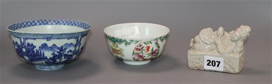 A Chinese famille rose bowl, Guangxu mark, a blue and white bowl and a Qing type brush rest